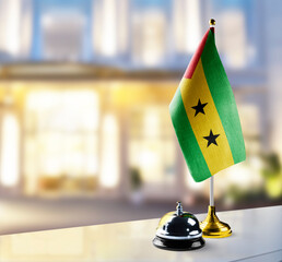 Sao Tome and Principe flag on the reception desk in the lobby of the hotel