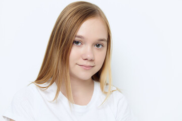Fototapeta premium cute smiling girl in white t-shirt close up isolated background