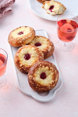 Brioche buns with cottage cheese and jam.
