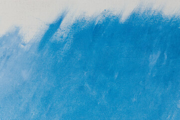 creative background, a spot of heavenly colored primer rubbed on the surface of a linen canvas, temporary object, close, toning