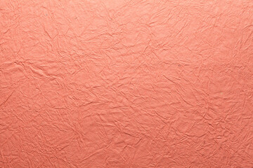 A beautiful pink color handmade paper of crumple or wrinkle texture with veins and fibers. Useful for background, 3d rendering.