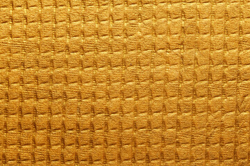 A beautiful golden yellow color handmade paper having embossing texture with veins and fibers. Useful for background, 3d rendering.