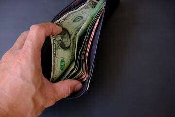Banknote money in wallet background and saving money and business growth concept,finance and...