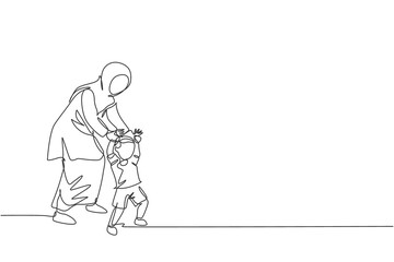One single line drawing of young Arabian mother holding her son's hand, teaching how to walk vector illustration. Happy Islamic muslim family parenting concept. Modern continuous line draw design