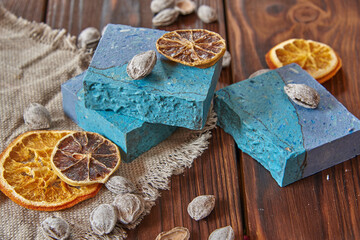 Scented, bright blue organic handmade soap and scented spices.