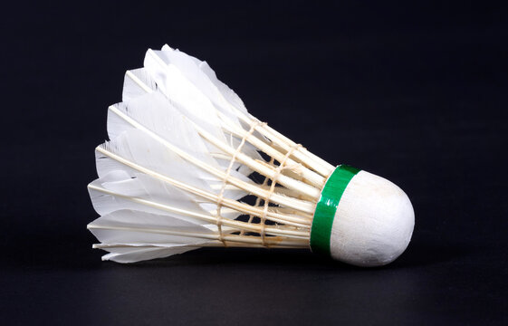 Close-up of very old shuttle badminton, isolated