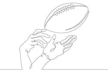 American football. Hands reach for the football and rugby ball in the game. Throwing and catching the ball.