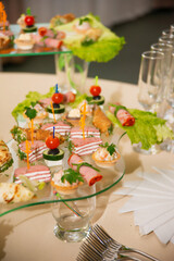 Empty glasses set, Elegant table setting for a festive dinner in the restaurant. Snacks on the buffet table