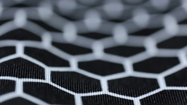 Black and white hexagon. Fabric polyester, spandex textile texture background