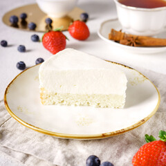 Delicious cake with fruits on background