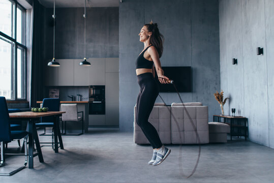 Sportsgirl With Skipping Rope At Home.