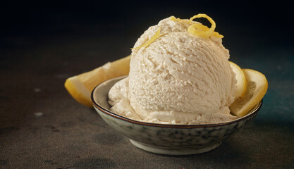 Delicious ice cream ball decorated with lemon slices