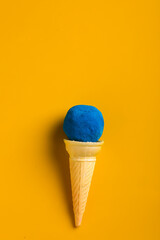 colors in shapes of ice cream scoops in cones for Indian holi festival