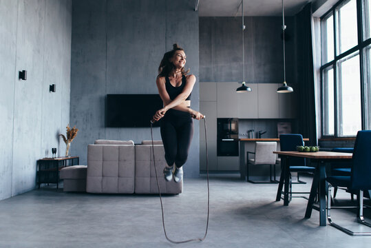 Sportsgirl With Skipping Rope At Home.