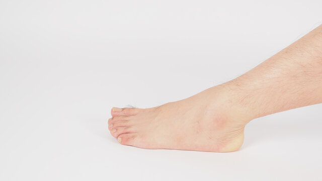 barefoot and legs of Asian Male is isolated on white background.
