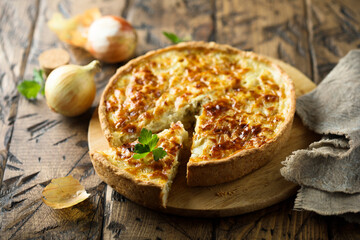 Traditional homemade onion pie or quiche - obrazy, fototapety, plakaty