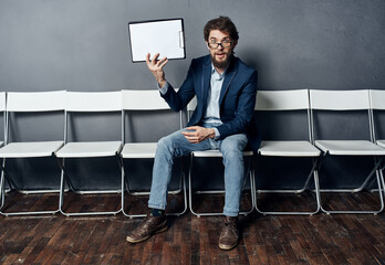 A man holds in his hands a job interview standby. Professional manager