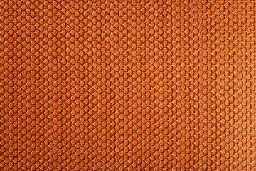 Close up photo of orange cloth texture.