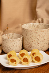 Delicious homemade pineapple roll tart for eid fitr on a with plate
