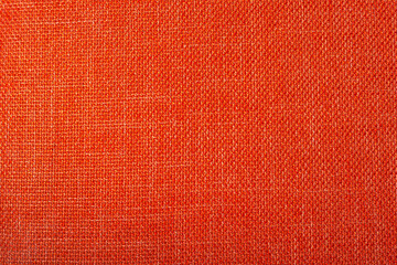 Close up photo of orange cloth texture.