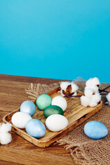 easter eggs decoration holiday wooden board blue background