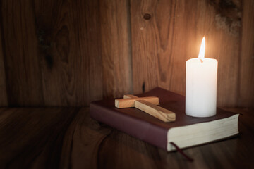 Bible, cross, symbol and red heart Candle light Symbol of supplication and faith The Study of Christ Believing in God, escape, there is a space to enter a message.