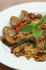 Spaghetti with northern Thai sausages