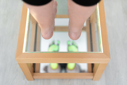 Foot examination - close up. Orthopedics, foot podoscope test. Barefoot footprint test.