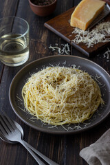 Roman pasta spaghetti with black pepper and cheese. Cacio e pepe. Recipes. Wine.