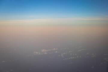 Beautiful blue sky with clouds shoot on airplane