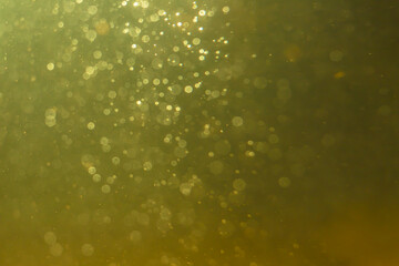 Abstract glitter gold bokeh