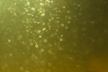 Abstract glitter gold bokeh