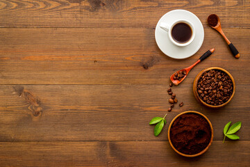 Coffee background. Coffee beans and hot drink, top view