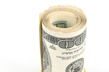 Hundred dollar bills rolled up with rubberband.
