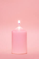 Coloured candle against the same coloured background