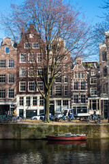 Obraz premium city canal houses in Amsterdam