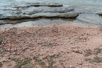 Red Sand and Stones of the red Sea Coast, Natural Texture Background