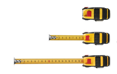 Set with measuring tapes on white background