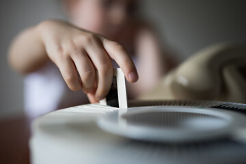 Young girl child looking at vintage retro slide