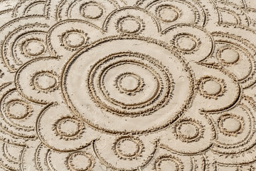 Dessins sur le sable de plage