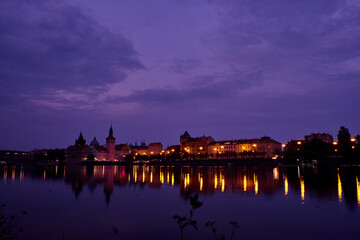 Obraz premium Long exposure night photography on the Vltava river in Prague, Czech Republic