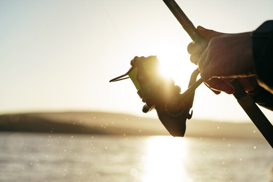 Fisherman Hands Holding Fishing Rod Close Up