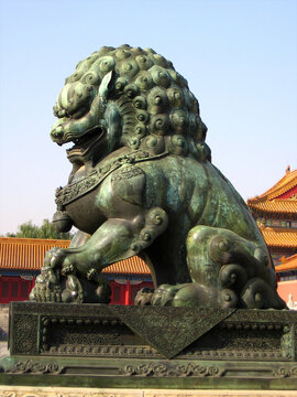 Beijing, China - November 10, 2010: Sculpture of guardian lion at the Gate of Supreme Harmony, the second major gate in the south of the Forbidden City.
