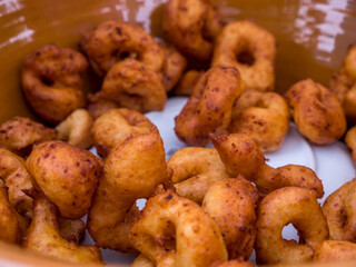 frying pan with mallorquin traditional sweet dish called bunyols, majorca, spain