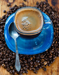 cup of coffee with beans