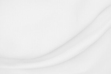 Beautiful white fabric waves, soft focus, used for backgrounds. White cloth background