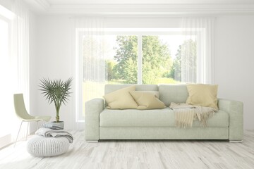 White living room with sofa and summer landscape in window. Scandinavian interior design. 3D illustration