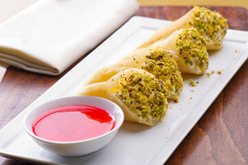 Qatayef With Cream And Pistachio, Ramadan Food Concept..
