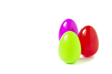 Three colored eggs as a symbol of Easter
