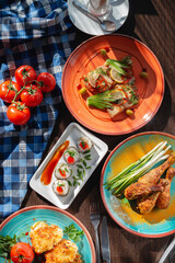 Appetizing homemade sushi rolls on the table in a beautiful setting, sunny lighting